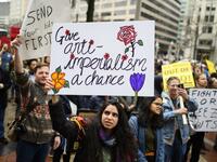 Anti-war activist demonstrate outside the Trump International Hotel in Washington, DC, on January 4, 2020. Demonstrators are protesting the US drone attack which killed Iran's Major General Qasem Soleimani in Iraq on January 3, a dramatic escalation in spiralling tensions between Iran and the US, which pledged to send thousands more troops to the region. ANDREW CABALLERO-REYNOLDS / AFP