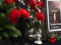Flowers, candles and a placard reading "Tehran-Kiev We mourn" are seen placed outside the Iranian embassy in Kiev on January 8, 2020, in remembrance of the victims of the Ukraine International Airlines Boeing 737-800 crash in the Iranian capital Tehran. A Ukrainian airliner carrying 176 people from seven countries crashed shortly after takeoff from Tehran on January 8, 2020 killing all on board. The vast majority of the passengers on the Boeing 737, which had been flying from Tehran to Kiev for Ukraine Inte