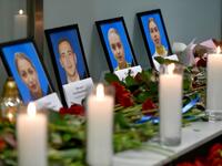 Portraits of the victims of the Ukraine International Airlines Boeing 737-800 crash in the Iranian capital Tehran, are seen at a memorial at the Boryspil airport outside Kiev on January 8, 2020. A Ukrainian airliner crashed shortly after take-off from Tehran Wednesday killing all 176 people on board, in a disaster striking a region rattled by heightened military tensions. Sergei SUPINSKY / AFP