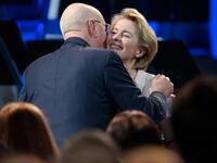 President of the European Commission Ursula von der Leyen (R) is greeted by World Economic Forum (WEF) founder and executive chairman Klaus Schwab after delivering a speech marking the 50th anniversary of the World Economic Forum during the WEF's annual meeting in Davos, on January 20, 2020. Fabrice COFFRINI / AFP