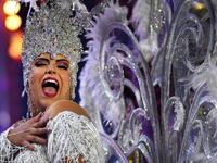 A participant presents her outfit during the Queen of the Carnival pageant contest in Santa Cruz de Tenerife, on the Spanish Canary island of Tenerife, on February 19, 2020. Gabriel BOUYS / AFP