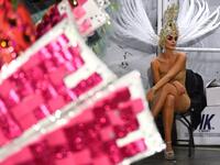 A participant waits backstage before presenting her outfit during the Queen of the Carnival pageant contest in Santa Cruz de Tenerife, on the Spanish Canary island of Tenerife, on February 19, 2020. Gabriel BOUYS / AFP