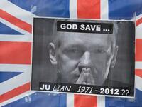 In this file photo taken on May 30, 2012 a portrait of Wikileaks founder Julian Assange is seen taped to a Union Flag outside the Supreme Court in central London, ahead of the verdict on Assange's bid to avoid extradition to Sweden. Later, Britain's Supreme Court ruled that Assange can be extradited to Sweden over alleged sex crimes, as it rejected his appeal. Jailed WikiLeaks founder Julian Assange is facing extradition to the United States over the 2010 publication of thousands of leaked classified docume