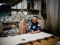 An employees of Grishko company produces pointe shoes in the company's Moscow workshop on February 25, 2020. Born in the chaos of the collapse of the Soviet Union, the Grishko family business has emerged among the top makers in the world of dance shoes, notably classic ballet pointe shoes, worn on the world's great stages. Dimitar DILKOFF / AFP