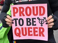 An Indonesian woman holds a banner to mark the International Women’s Day in Jakarta on March 8, 2020. ADEK BERRY / AFP