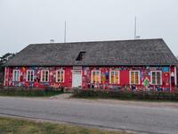 A picture taken on November 20, 2019 shows the local museum on Kihnu island in the Baltic Sea, 10 kilometres (six miles) off the coast of Estonia. Steeped in folk traditions, Kihnu's historic way of life however is now threatened as economic hardship drives more and more islanders away in search of work. Alessandro RAMPAZZO / AFP