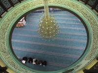 A few Palestinian worshippers pray at a mosque during the usually crowded weekly Friday prayers, in the midst of the coronavirus COVID-19 outbreak, in the West Bank town of Hebron on March 13, 2020. HAZEM BADER / AFP