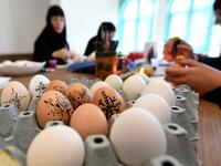 Orthodox Christian nuns decorate Easter eggs in a women’s Orthodox monastery near Danilovgrad west of capital Podgorica, on April 17, 2020. For the Orthodox Church in Montenegro, Easter 2020 falls on April 19. Savo PRELEVIC / AFP