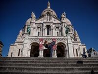 Syrian dancer and choreographer Yara al-Hasbani performs a dance on the empty Trocadero square in front of the Eiffel tower in Paris on April 22, 2020, on the 37th day of a strict lockdown in France to stop the spread of COVID-19 (novel coronavirus). Yara al-Hasbani was putting the finishing touches to her make-up for a performance of "Romeo and Juliet" in Damascus when she found out her father had been tortured to death. Sameer Al-DOUMY / AFP