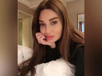 Cyrine Abdelnour taking selfies at home