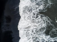 The black sand beach in Iceland. Sea aerial view and top view. Amazing nature, beautiful backgrounds and colors (Shutterstock)