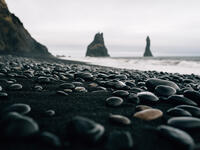 Stones on a black beach in Iceland (Shutterstock)