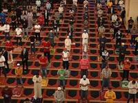 Muslim worshippers take part in a morning prayer to celebrate the Eid al-Fitr holiday while wearing protective masks and maintaining social distancing due to the COVID-19 pandemic, at Mohammed al-Amin Mosque in the Lebanese capital Beirut's downtown district on May 24, 2020. ANWAR AMRO / AFP