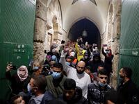 Palestinian Muslim worshippers enter to pray at the al-Aqsa mosque compound, Islam's third holiest site, in Jerusalem's Old City on May 31, 2020, after a two-month closure due to the COVID-19 pandemic. Ahmad GHARABLI / AFP