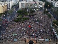Protesters gather in Tel Aviv's Rabin Square on June 6, 2020, to denounce Israel's plan to annex parts of the occupied West Bank. Israeli Prime Minister Benjamin Netanyahu has vowed to forge ahead with annexing settlements and the Jordan Valley, in line with the peace proposals unveiled in January by US President Donald Trump. The plan has been angrily rejected by the Palestinians, who say they were not consulted on proposals they see as capitulating to Israeli demands. JACK GUEZ / AFP