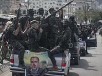 Members of the Palestinian Islamic Jihad group take part in a symbolic funeral for the movement's former leader Ramadan Shalah in Gaza city, on June 7, 2020, a day after he died in neighbouring Lebanon. The 62-year-old died in a Beirut hospital after a long illness, before his body was transported to neighbouring Syria, a Palestinian source said. MAHMUD HAMS / AFP