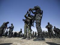 Members of the Palestinian Islamic Jihad group take part in a military parade during a condolence ceremony for the movement's former leader Ramadan Shalah in Gaza city, on June 8, 2020, two days after his death in neighbouring Lebanon. The 62-year-old was buried in Syria on June 7, a day following his death after a long illness. Mohammed ABED / AFP
