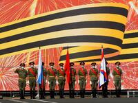 Russian servicemen wearing face masks and gloves take part in a rehearsal for June 24 military parade marking Soviet victory in World War II, which was postponed due to the coronavirus pandemic, at Dvortsovaya Square in Saint Petersburg on June 18, 2020. OLGA MALTSEVA / AFP