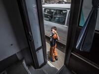 A homeless child leaves one of the mobile units run by the Egyptian authorities and used as part of the "Atfal bala ma'wa" (Children without a home) social program, in the capital Cairo's Abbasia district on June 22, 2020. Khaled DESOUKI / AFP