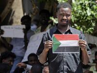 Sudanese workers, who lost their jobs due to the deteriorating economic situation in Lebanon, protest outside their county's embassy in Beirut to demand repatriation, on July 2, 2020. JOSEPH EID / AFP