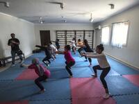 Youths from the "Children without Shelter" program attend a fitness sessions in their residences at Banati foundation in 6th October City on the outskirts of the capital Cairo on July 13, 2020.Khaled DESOUKI / AFP