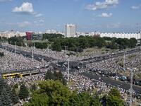 Belarus opposition supporters attend a rally in central Minsk on August 16, 2020. The Belarusian strongman, who has ruled his ex-Soviet country with an iron grip since 1994, is under increasing pressure from the streets and abroad over his claim to have won re-election on August 9, with 80 percent of the vote. Sergei GAPON / AFP