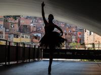 Kemilly Luanda, student of the Ballet Paraisopolis, poses during a rehearse in Paraisopolis favela, outskirts of Sao Paulo, Brazil on August 27, 2020, amid the new coronavirus COVID-19 pandemic. NELSON ALMEIDA / AFP