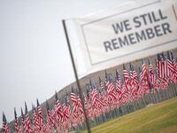 Some 3,000 flags comprise a 9/11 memorial at Pepperdine University in Malibu, California, on September 11, 2020, as the US commemorates the 19th anniversary of the attacks. Each flag represents a victim and their nationality. VALERIE MACON / AFP