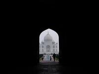 Tourists visit the Taj Mahal in Agra on September 21, 2020. The Taj Mahal reopened to visitors on September 21 in a symbolic business-as-usual gesture even as India looks set to overtake the US as the global leader in coronavirus infections. Sajjad HUSSAIN / AFP