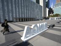 A journalist walks around empty grounds at the United Nations September 22, 2020 during the the 75th General Assembly of the United Nations which is mostly virtual due to the covid-19 pandemic in New York. UN Secretary-General Antonio Guterres urged the world to prevent a Cold War between the United States and China and halt conflicts so it can focus on the covid-19 pandemic. TIMOTHY A. CLARY / AFP