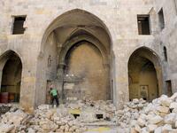 Syrian workers take part in the reconstruction of Martini restaurant and hotel in the Jdaideh neighbourhood in Aleppo's Old City on October 17, 2020. AFP