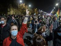 Protestors shout slogans as they are blocked by riot police guarding the house of Jaroslaw Kaczynski, leader of Poland's ruling Law and Justice party (PIS) during a demonstration against a decision by the Constitutional Court on abortion law restriction,in Warsaw on October 23, 2020. Wojtek RADWANSKI / AFP