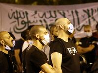Arab-Israeli protesters gather outside the residence of the French Ambassador to Israel, in Tel Aviv on October 24, 2020, in response to comments by French President Emmanuel Macron defending cartoons of the Prophet Mohammed. JACK GUEZ / AFP