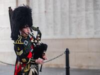 Belgian piper Gil Vermeulen plays the pipes during the Last Post ceremony at the Commonwealth War Graves Commission Ypres Memorial at the Menin Gate in Ypres on November 11, 2020 on the occasion of the commemorations marking the 102nd anniversary of the November 11, 1918 Armistice, ending World War I (WWI). Kurt DESPLENTER / BELGA / AFP