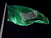 The Saudi national flag flutters at the historical site of al-Tarif in Diriyah district, on the outskirts of Saudi capital Riyadh, on November 20, 2020. Saudi Arabia hosts the G20 summit on November 21 in a first for an Arab nation, with the downsized virtual forum dominated by efforts to tackle a resurgent coronavirus pandemic and crippling economic crisis. FAYEZ NURELDINE / AFP