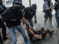 French lawmakers on Tuesday began debating a bill that could ban dissemination of images of police officers' faces, triggering protests in Paris and other French cities. (Picture credit: Jean-François Monier / AFP)