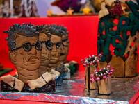 A gingerbread model with the shape of Sweden's state epidemiologist Anders Tegnell, is pictured at the ArkDes, Sweden’s national centre for architecture and design, during this year's Gingerbread House 2020 competition with the theme 'Distance', on December 7, 2020 in Stockholm, Sweden. Jonathan NACKSTRAND / AFP