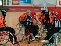 Disabled Yemeni women take part in a local wheelchair basketball championship in Yemen's capital Sanaa on December 8, 2020. In conflict-ridden Yemen, nine teams, including five-all women groups, competed in a local championship for the disabled in the capital Sanaa, which has been under rebel control since 2014. The players are competing to be embraced by society for their strengths rather than be viewed as a burden during the time of war. Mohammed HUWAIS / AFP