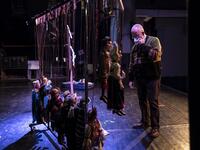 Augusto Grilli checks his puppets on the stage at the " Alfa Theatre" in Turin, on November 30, 2020. The Grilli family has a collection of more than 20,000 objects from around the world, everything from theatres, marionettes and glove puppets to shadow figures and silhouettes. A long-time dream of Grilli and his wife Mariarosa, 78, the museum is due to open in 2023 in Turin, financed both privately and publicly with the help of different institutions.  Marco Bertorello / AFP