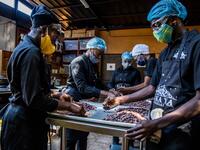 Sorting of cocoa beans according to their size and appearance is done in the workshops of Makaya Chocolat on December 23, 2020 in Petionville, Haiti. Although small in the face of South America's giants, Haiti is slowly developing its cocoa industry to ensure better incomes for thousands of modest farmers and to end the stereotype of gastronomic art known as the domain of wealthy countries. Valerie Baeriswyl / AFP