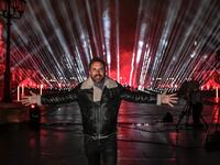 French DJ David Guetta poses on the stage set up for his 2021 New Year's eve livestream charity concert "United at Home", in the Cour Napoleon, in front of the Louvre Pyramid, in Paris, on December 29, 2020, amid the Covid-19 (novel coronavirus) pandemic. STEPHANE DE SAKUTIN / AFP