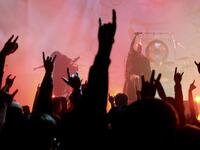 This picture taken on January 2, 2021 shows Joe Henley (R), a leading vocalist of Taiwanese death metal band 'Dharma' performing during a concert in Taichung. Sam Yeh / AFP