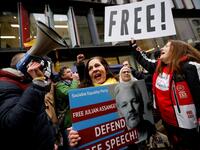 Supporters of Wikileaks founder Julian Assange celebrate outside the Old Bailey court in central London after a judge ruled that Assange should not be extradited to the United States to face espionage charges for publishing secret documents online on January 4, 2021. Tolga Akmen / AFP