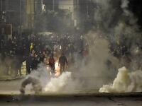 The social unrest comes at a time of economic crisis, worsened by the pandemic, that has sparked rapid inflation and high youth unemployment and led many people to leave the North African country. FETHI BELAID / AFP