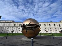 A view shows the Sphere within a sphere by italian artist Arnaldo Pomodoro in the Vatican Museum on its reopening day to the public on February 1, 2021 in Vatican City, as the city-state eases its closure aimed at curbing the spread of the COVID-19 infection, caused by the new coronavirus. Andreas SOLARO / AFP