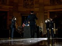 Capitol Police Officers pay their respects to late US Capitol Police officer Brian Sicknick as he lies in honor in the US Capitol Rotunda in Washington, DC February 2, 2021. Erin Schaff / POOL / AFP