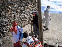 In this photograph taken on February 15, 2021, doctors and nurses from the Bahcesaray public hospital vaccination team, arrive at the village of Guneyyamac in eastern Turkey, as part of an expedition to vaccinate residents of 65 years old or above with Sinovac's CoronaVac Covid-19 vaccine. Turkey's population of more than 83 million is spread out across Europe and Asia and covers some seemingly impregnable terrain. The vaccination effort with China's CoronaVac jab kicked off with a bang in mid-January when 