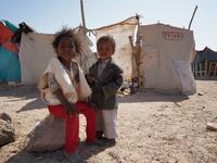 Yemeni children are pictured at the Jaw al-Naseem camp for internally displaced people on the outskirts of the northern city of Marib, on February 18, 2021 in the Saudi-backed Yemeni government's last northern bastion. Until early last year, life in Marib city was relatively peaceful despite the Yemen's civil war that erupted in 2014. The United Nations warned last week of a potential humanitarian disaster if the fight for Marib continues, saying it has put "millions of civilians at risk". More than 3.3 mil