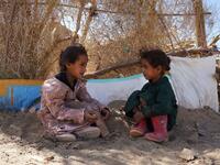 Yemeni girls sit at the Jaw al-Naseem camp for internally displaced people on the outskirts of the northern city of Marib, on February 18, 2021 in the Saudi-backed Yemeni government's last northern bastion. Until early last year, life in Marib city was relatively peaceful despite the Yemen's civil war that erupted in 2014. The United Nations warned last week of a potential humanitarian disaster if the fight for Marib continues, saying it has put "millions of civilians at risk". More than 3.3 million have be