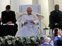 Pope Francis speaks during an interfaith service with many of Iraq's religious minorities 